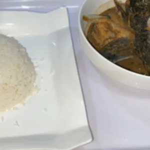 Full catfish pepper soup with steamed rice